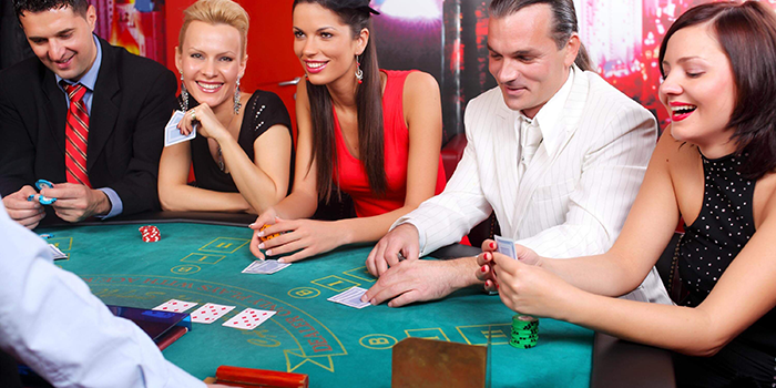 happy people playing casino games